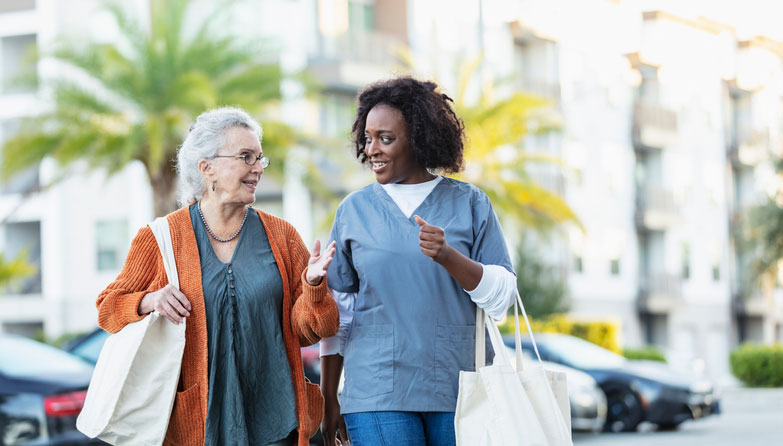 caregiver walking senior