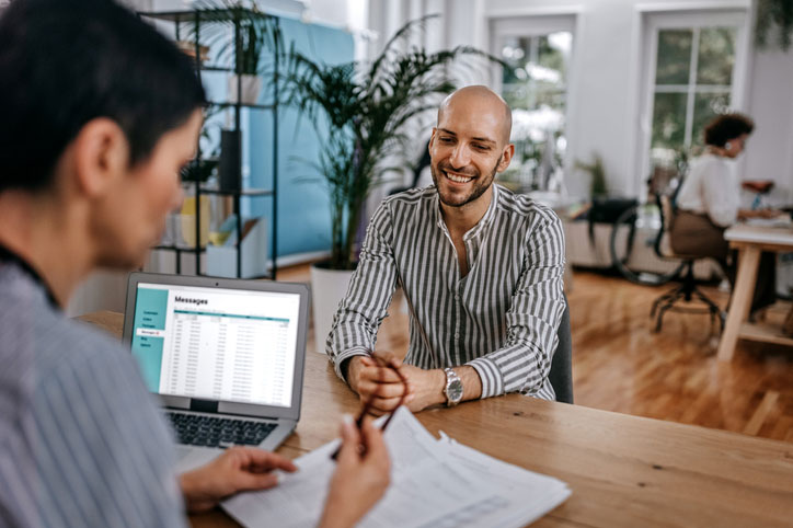 confident interviewee sitting in interview