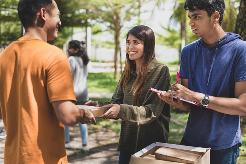 distributing food to the needy