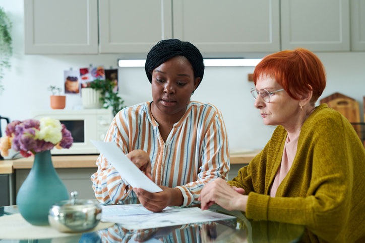 social worker helping senior