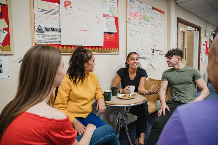 teens talking at youth club